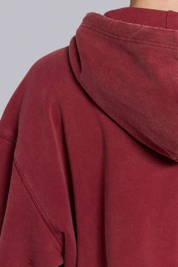 Röd, solblekt hoodie med vaffelfoder och dragkedja