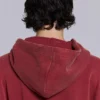 Röd, solblekt hoodie med vaffelfoder och dragkedja