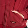 Röd, solblekt hoodie med vaffelfoder och dragkedja
