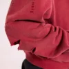 Röd, solblekt hoodie med vaffelfoder och dragkedja