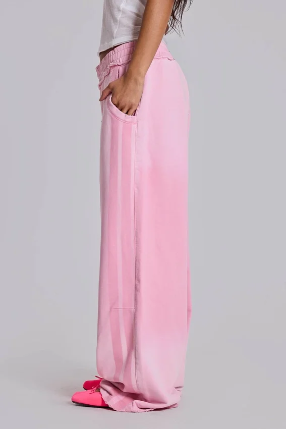 Rosa sportiga, baggy Monster Joggers