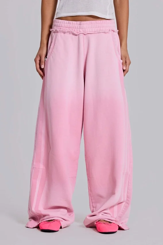 Rosa sportiga, baggy Monster Joggers