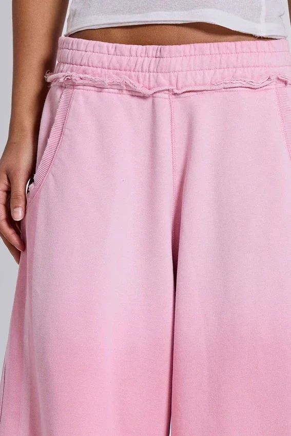 Rosa sportiga, baggy Monster Joggers
