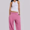 Rosa, vidbyxor med uppvikt benslut i Monster Joggers-stil