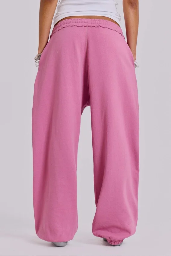 Rosa, vidbyxor med uppvikt benslut i Monster Joggers-stil