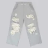 Slitna gråmelerade, baggy Monster Joggers
