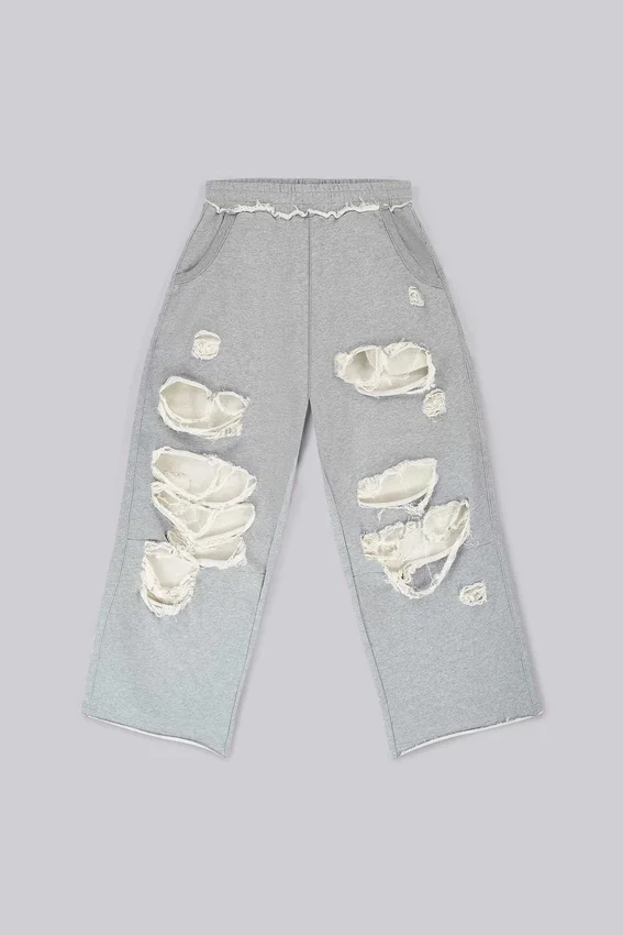 Slitna gråmelerade, baggy Monster Joggers