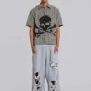Slitna gråmelerade, baggy Monster Joggers