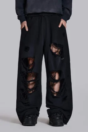 Slitna svarta, baggy Monster Joggers