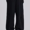 Slitna svarta, baggy Monster Joggers