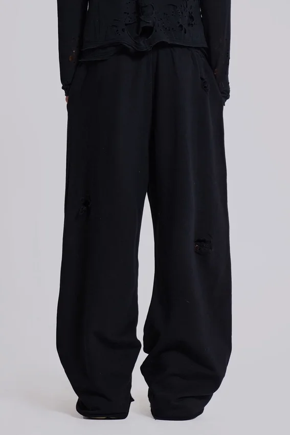 Slitna svarta, baggy Monster Joggers