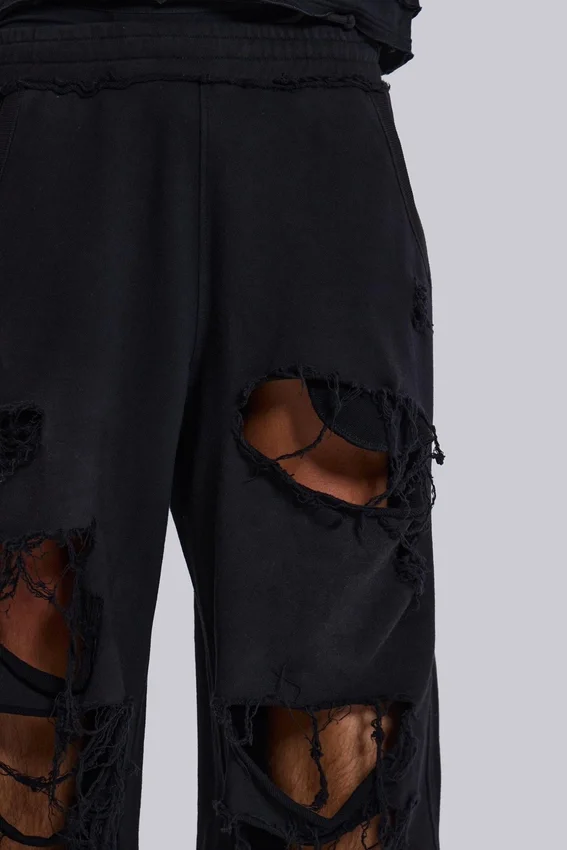 Slitna svarta, baggy Monster Joggers