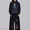 Slitna svarta, baggy Monster Joggers