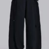 Slitna svarta, baggy Monster Joggers