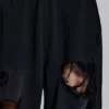 Slitna svarta, baggy Monster Joggers