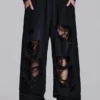 Slitna svarta, baggy Monster Joggers