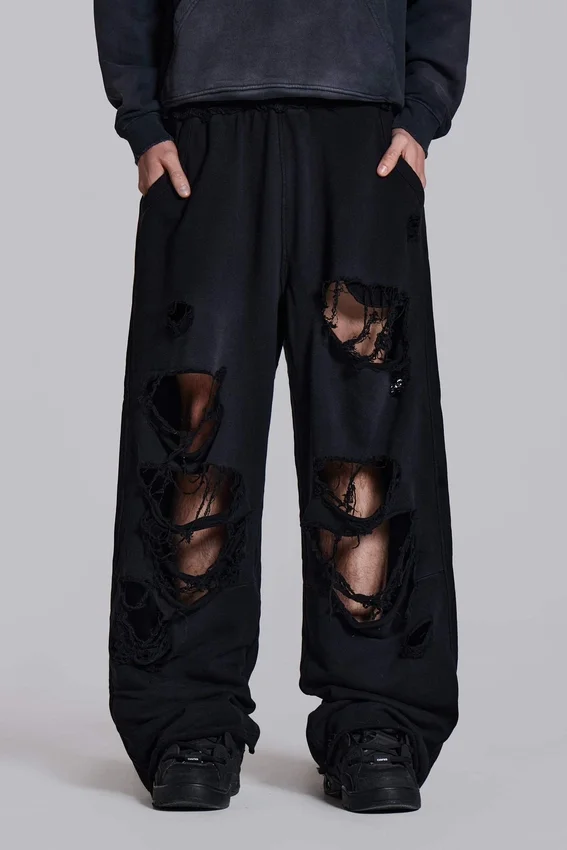 Slitna svarta, baggy Monster Joggers