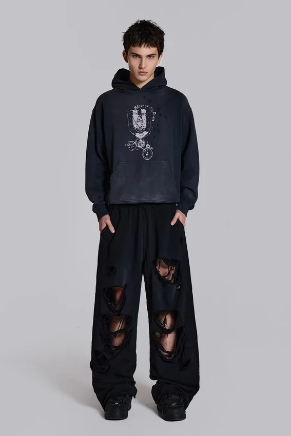 Slitna svarta, baggy Monster Joggers