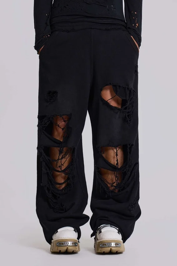 Slitna svarta, baggy Monster Joggers
