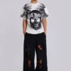 Slitna svarta, baggy Monster Joggers