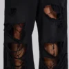 Slitna svarta, baggy Monster Joggers