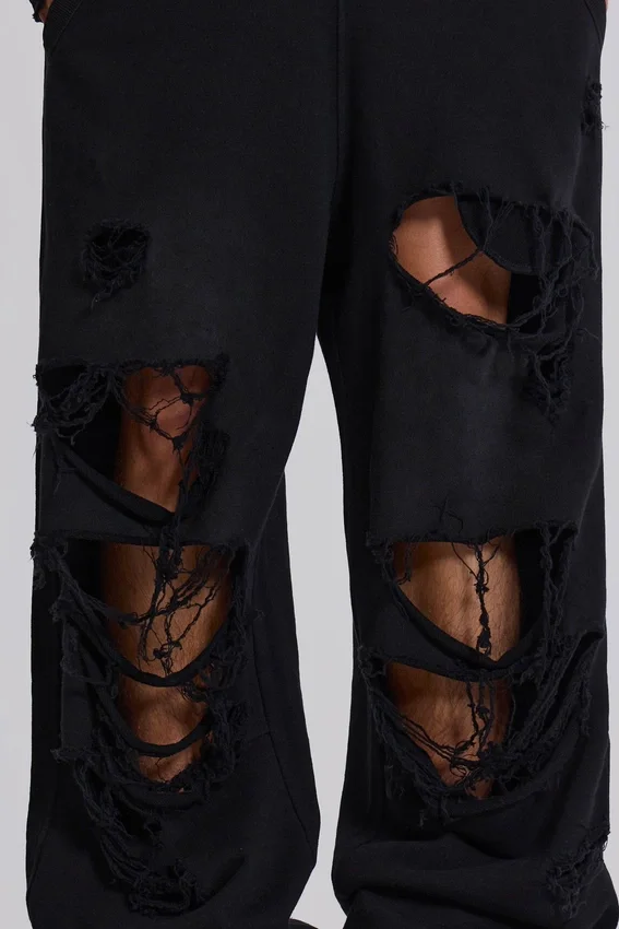 Slitna svarta, baggy Monster Joggers