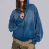 Solblekt hoodie i våffelväv med nitar