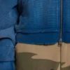 Solblekt hoodie i våffelväv med nitar