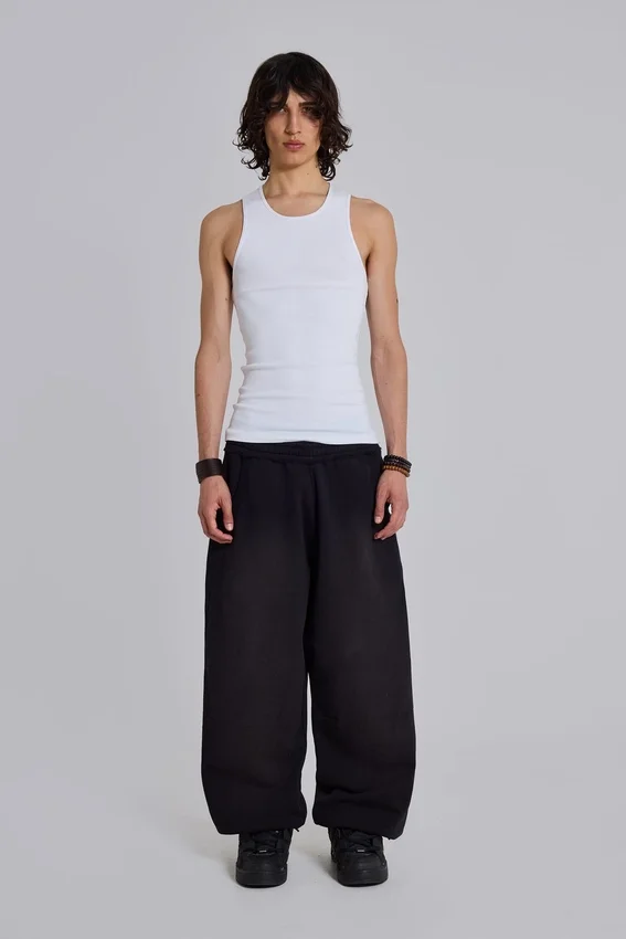Svarta, baggy Monster Joggers med uppvikt nederkant