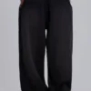 Svarta, baggy Monster Joggers med uppvikt nederkant