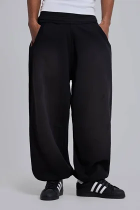 Svarta, baggy Monster Joggers med uppvikt nederkant
