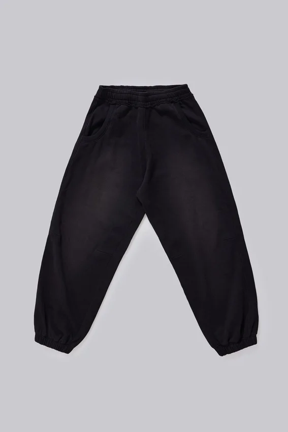 Svarta, baggy Monster Joggers med uppvikt nederkant