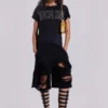Svarta slitage-behandlade Monster-shorts