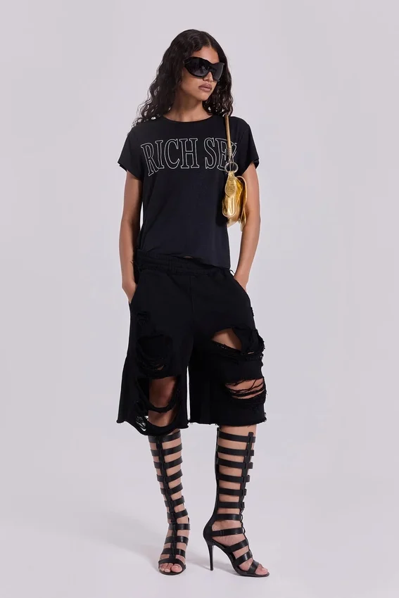 Svarta slitage-behandlade Monster-shorts