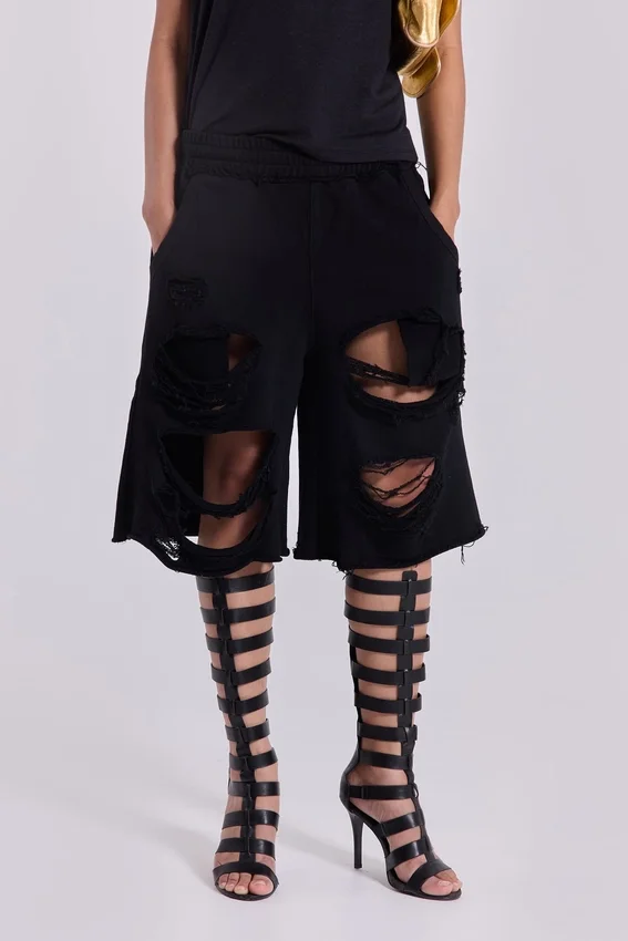 Svarta slitage-behandlade Monster-shorts