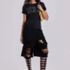 Svarta slitage-behandlade Monster-shorts