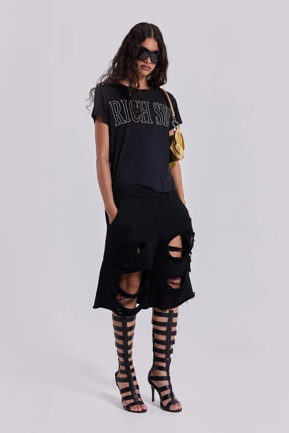 Svarta slitage-behandlade Monster-shorts