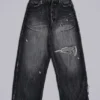 Svarta, slitna XL Colossus Jeans
