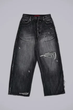 Svarta, slitna XL Colossus Jeans