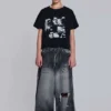 Svarta, slitna XL Colossus Jeans