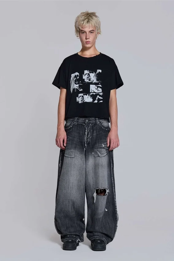 Svarta, slitna XL Colossus Jeans