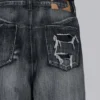Svarta, slitna XL Colossus Jeans