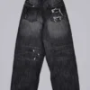 Svarta, slitna XL Colossus Jeans