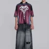 Svarta, slitna XL Colossus Jeans