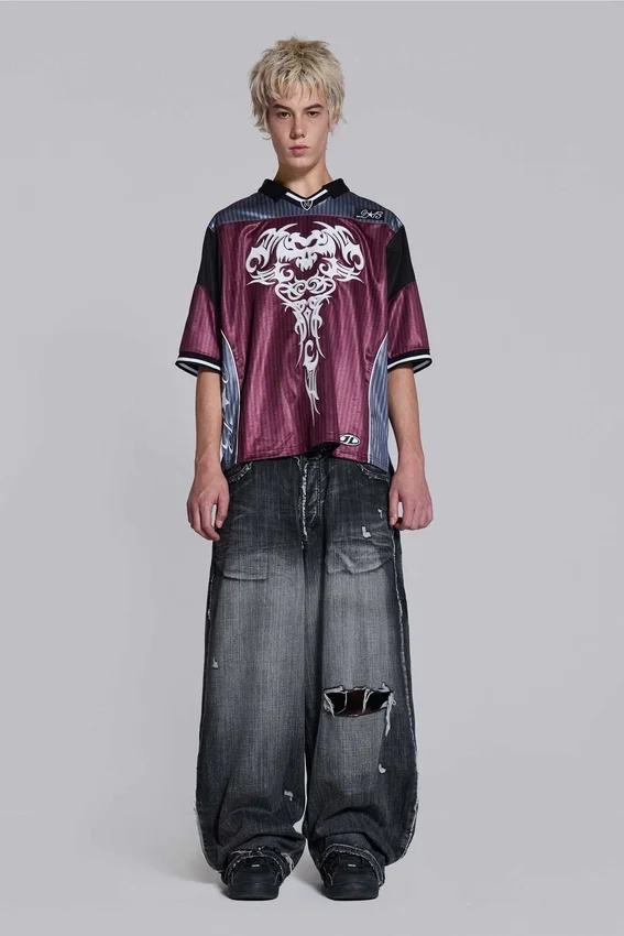 Svarta, slitna XL Colossus Jeans
