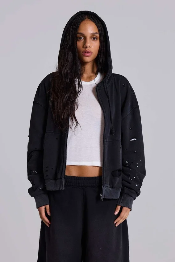 Tvättad svart hoodie med dragkedja, solblekt och våffelfodrad