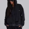 Tvättad svart hoodie med dragkedja, solblekt och våffelfodrad
