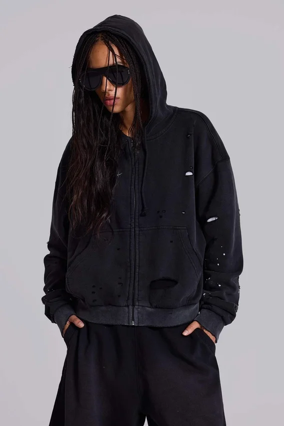 Tvättad svart hoodie med dragkedja, solblekt och våffelfodrad