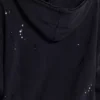 Tvättad svart hoodie med dragkedja, solblekt och våffelfodrad