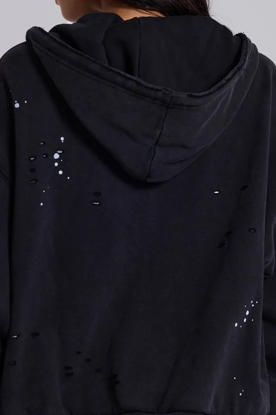 Tvättad svart hoodie med dragkedja, solblekt och våffelfodrad